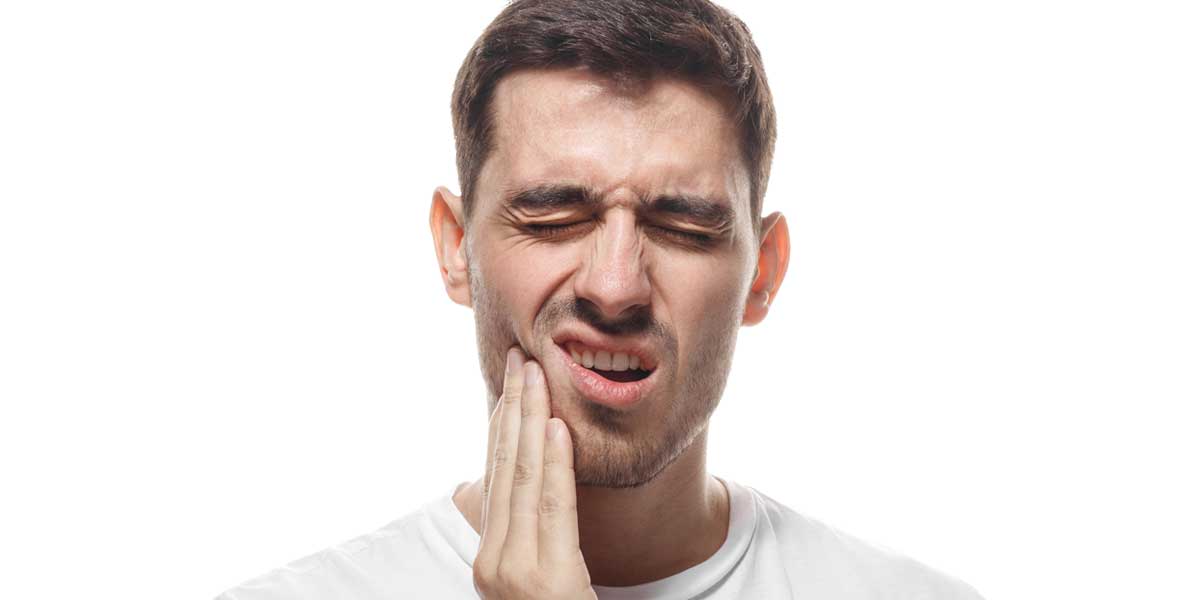 Man is Touching His Painful Mouth